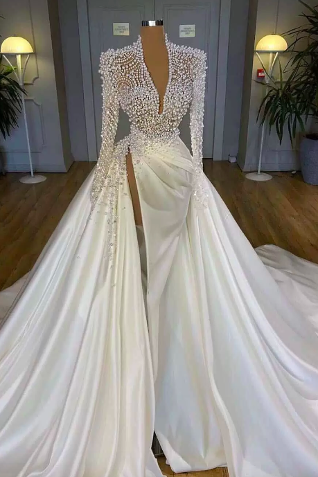 2022 Luxury Long Sleeves Mermaid Wedding Dresses Deep V Neck Illusion Pearls Crystal High Side Split Arabic Satin Bridal Gowns Robe De Mariée